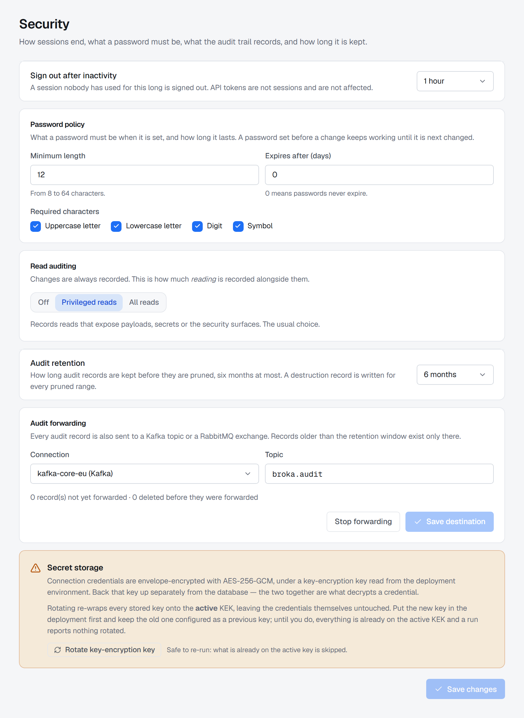 Settings › Security: Sign out after inactivity set to 1 hour; the Password policy at its defaults — a minimum length of 12, no expiry, and an uppercase letter, a lowercase letter, a digit and a symbol required; Read auditing on Privileged reads; Audit retention at 6 months; Audit forwarding to the Kafka connection kafka-core-eu and the topic broka.audit, with nothing waiting to be forwarded; and the Secret storage card with Rotate key-encryption key.
