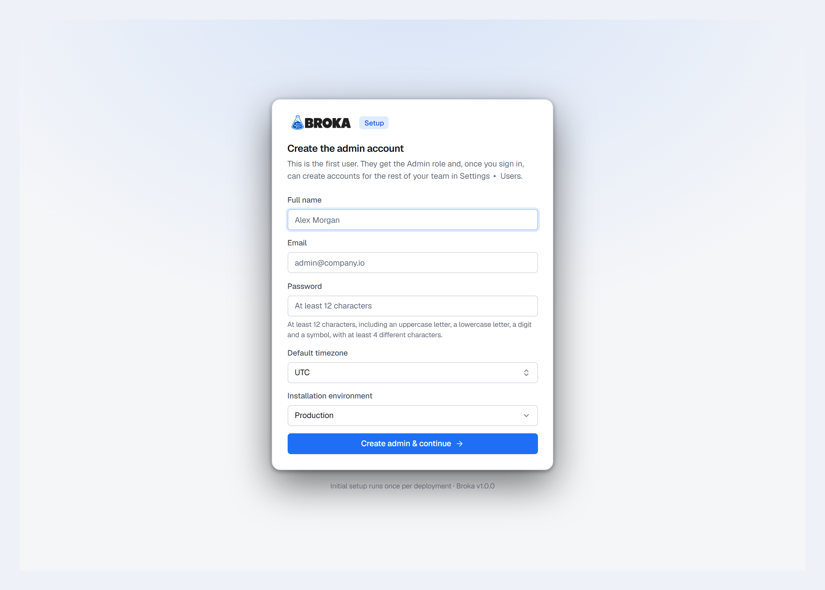 The first-run screen, 'Create the admin account': full name, email, a password with the policy stated beneath it — at least 12 characters, with an uppercase letter, a lowercase letter, a digit and a symbol — a default timezone set to UTC and the installation environment set to Production, above a 'Create admin & continue' button.
